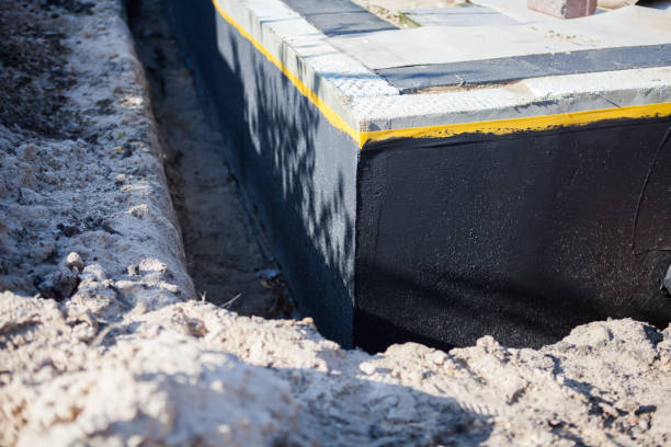 Professional Foundation Crack Repair technician working in Oakville, IN